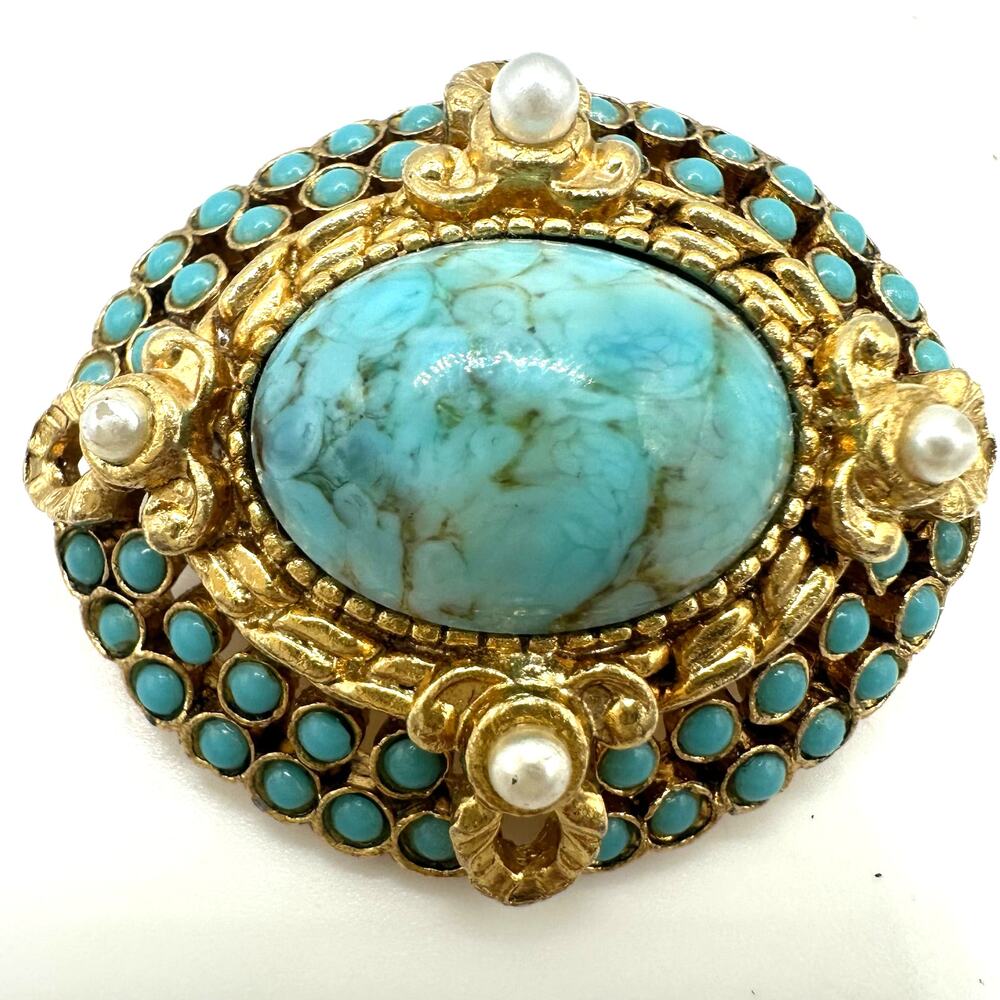 Sphinx numbered vintage gold tone turquoise art glass cabochon oval brooch pin